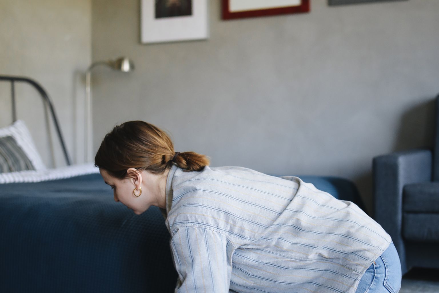 Woman cleaning a carpet to remove pet urine smell